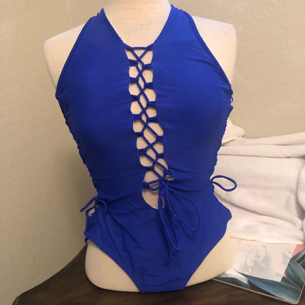 Blue lace up side one puce bathing suit